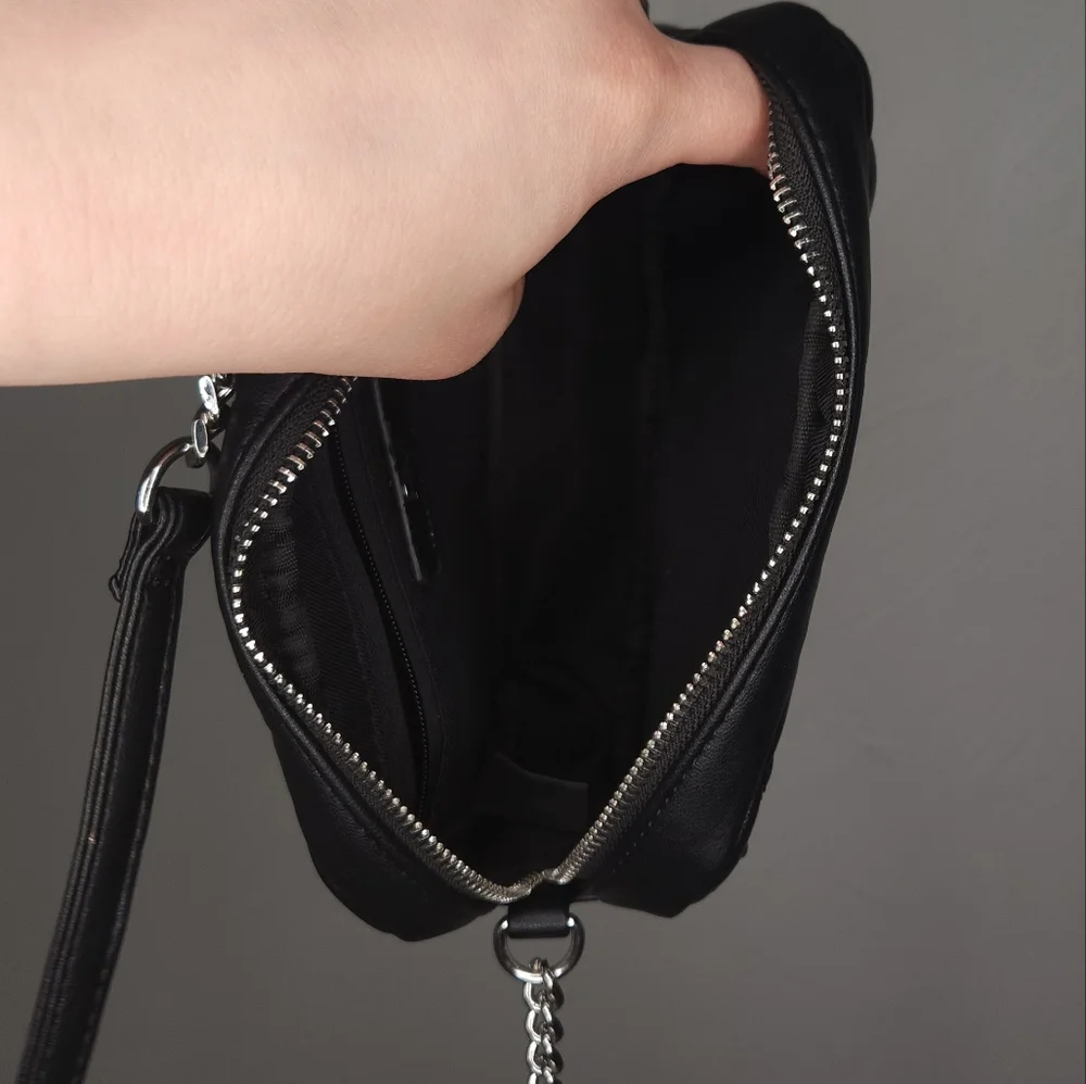 Rebecca Minkoff• Mini quilted studded black crossbody bag. 7.25” x 2.25” x 5.25”